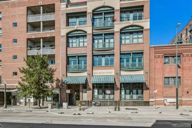 a front view of a building and a street
