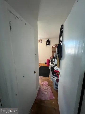 a view of a hallway with storage space