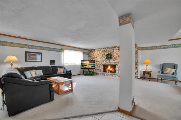 a living room with furniture and a couch