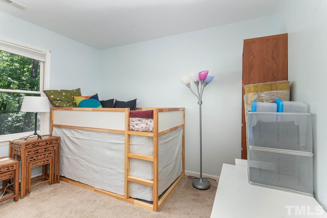 406 Old Fox Trail Durham, NC 27713 - Photo 17 of 23 a bedroom with a bed and a dresser