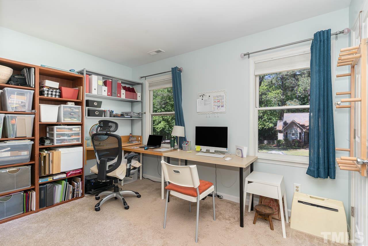 406 Old Fox Trail Durham, NC 27713 - Photo 18 of 23 a view of a workspace with furniture and a window