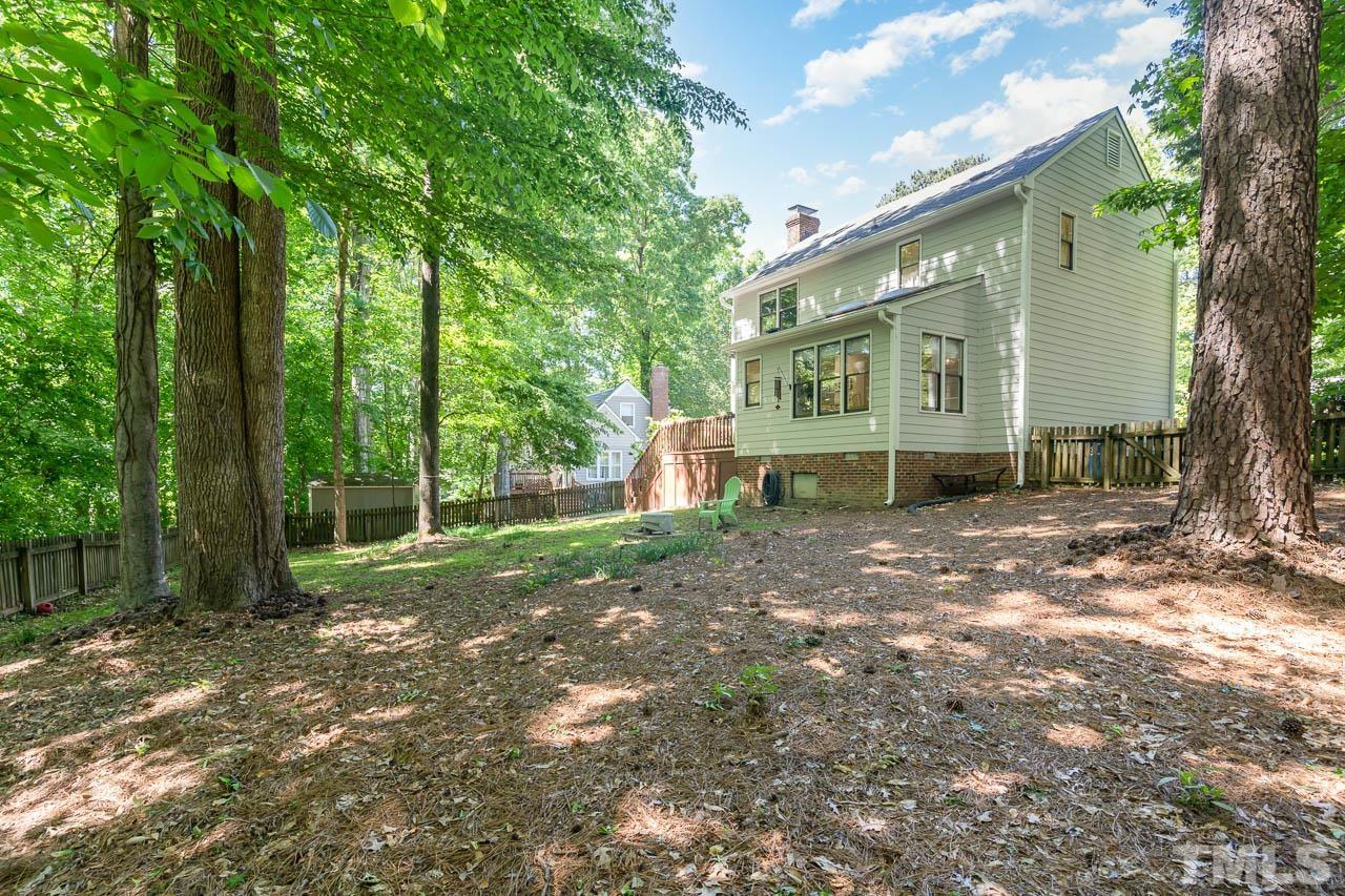 406 Old Fox Trail Durham, NC 27713 - Photo 20 of 23 a view of a house with backyard and garden