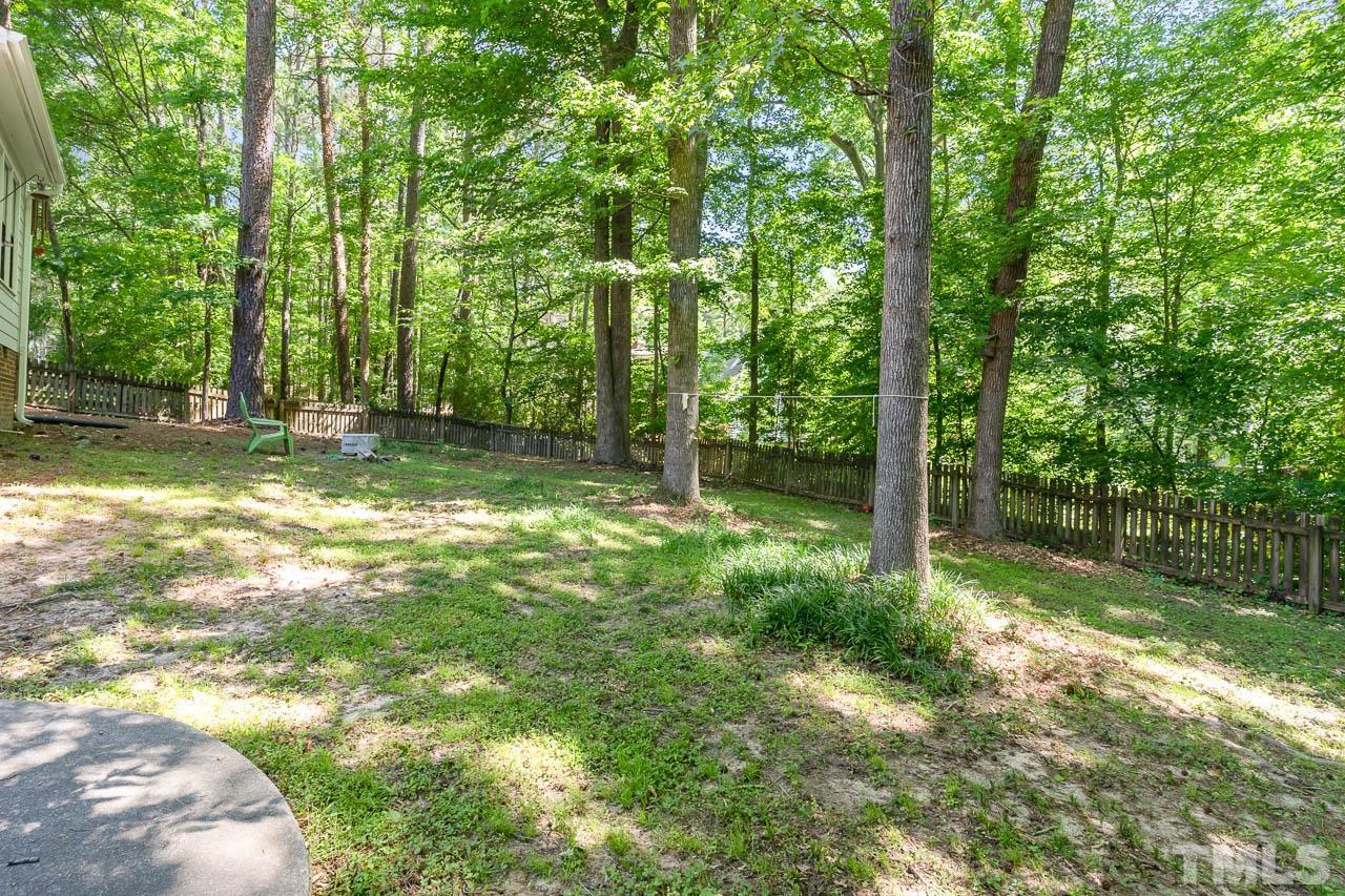 406 Old Fox Trail Durham, NC 27713 - Photo 23 of 23 a view of a yard with a tree