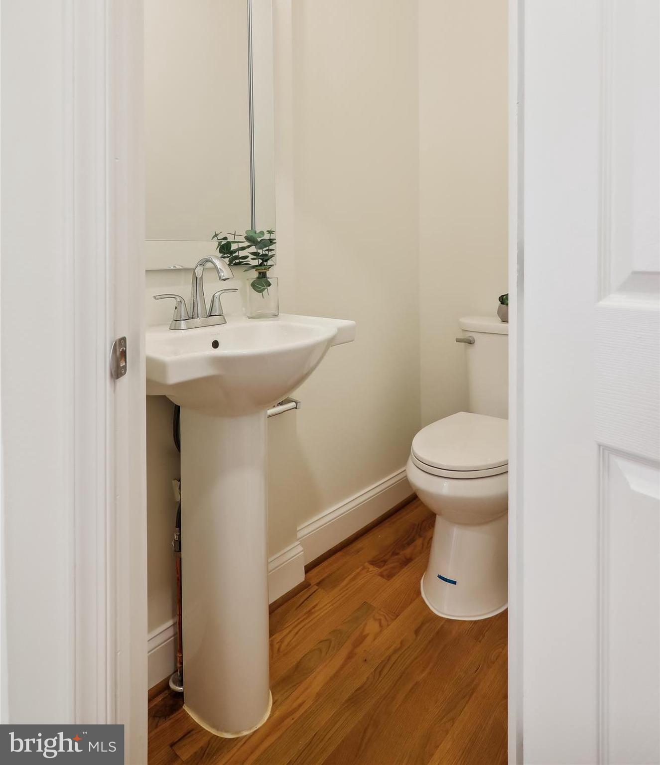 2462 Tunlaw Road Northwest Washington, DC 20007 - Photo 17 of 56 a bathroom with a sink and a toilet