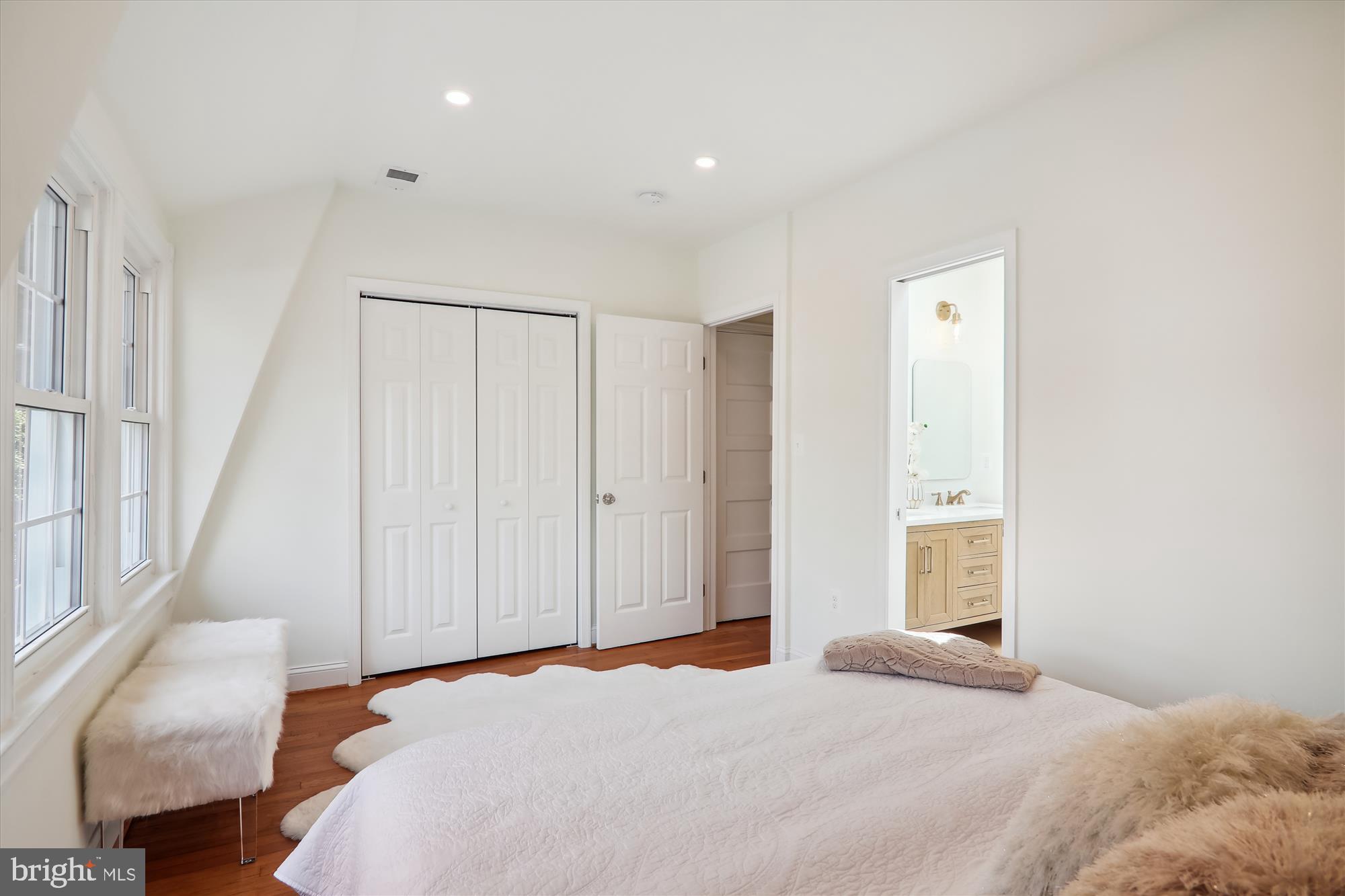 2462 Tunlaw Road Northwest Washington, DC 20007 - Photo 25 of 56 a bedroom with a bed and a window