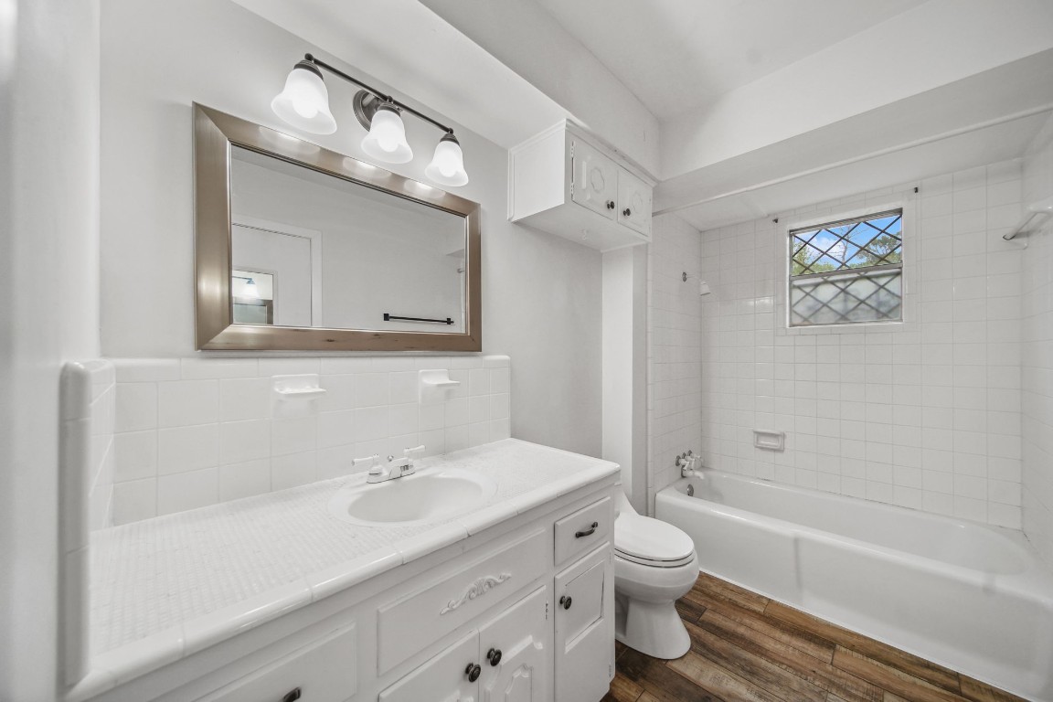 2019 North Thompson Street, Unit A Conroe, TX 77301 - Photo 11 of 17 Updated full bathroom blends classic finishings with new look.