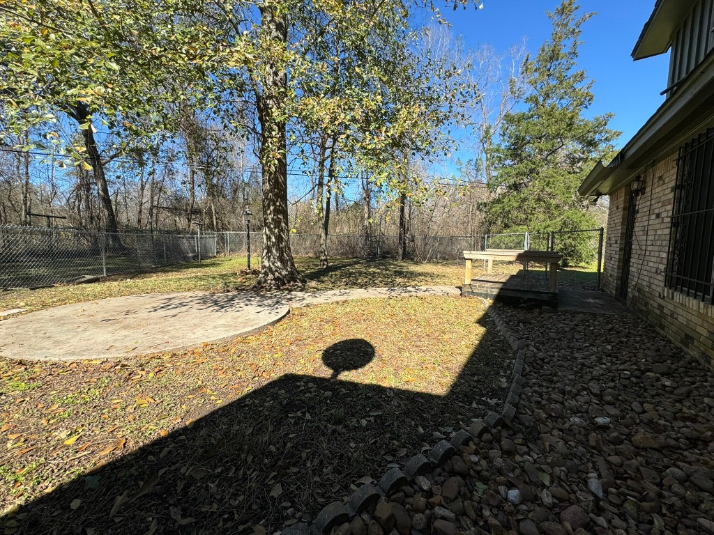 2019 North Thompson Street, Unit A Conroe, TX 77301 - Photo 14 of 17 Another view of the fenced back yard