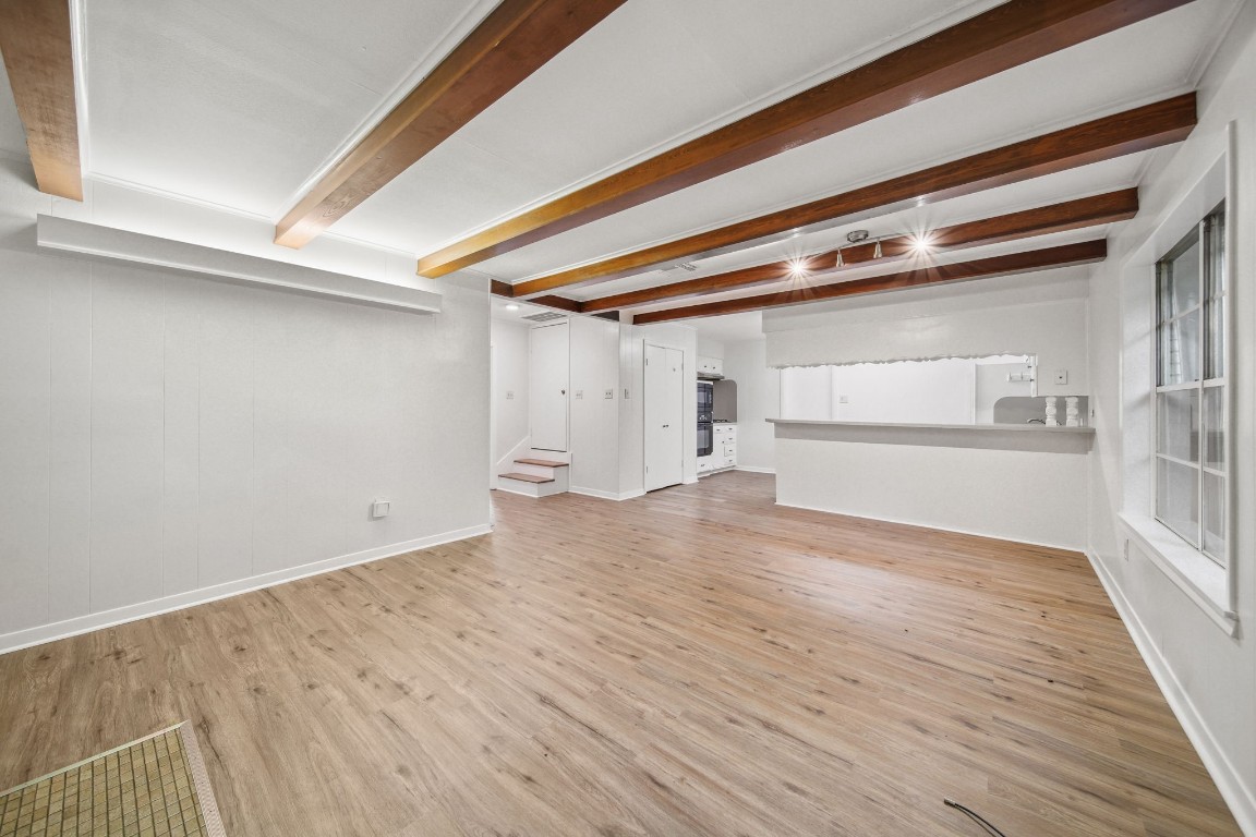 2019 North Thompson Street, Unit A Conroe, TX 77301 - Photo 3 of 17 Breakfast bar connects kitchen to living room