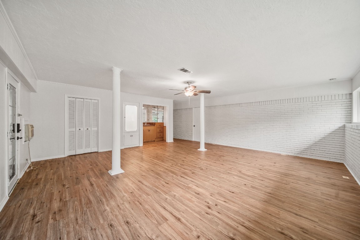 2019 North Thompson Street, Unit A Conroe, TX 77301 - Photo 10 of 17 Flexible room could be used as additional bedroom, office, work out with desk nook, display case, and wet bar.