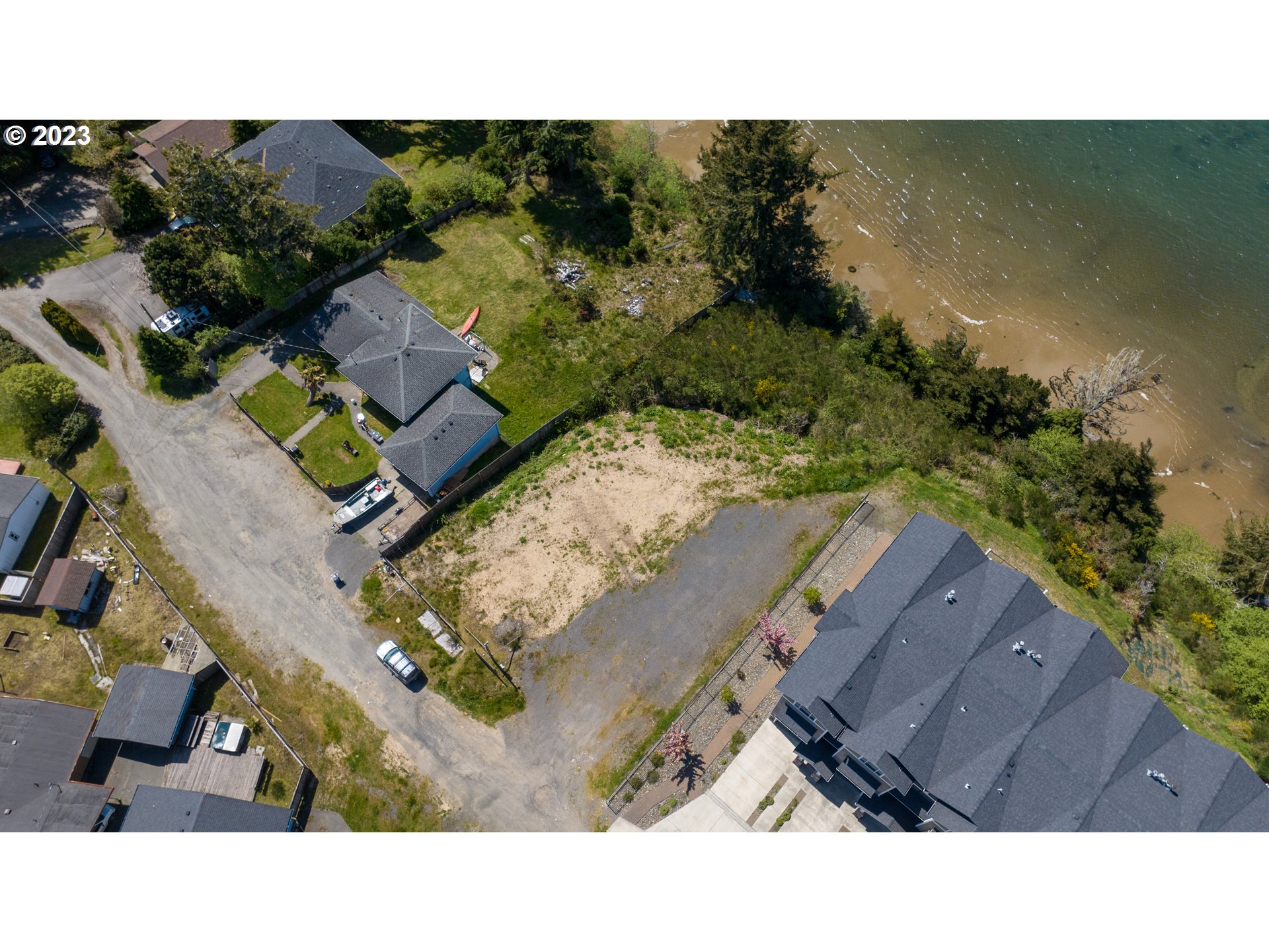 0 Seagate Street Coos Bay, OR 97420 - Photo 8 of 14 an aerial view of a house with a yard