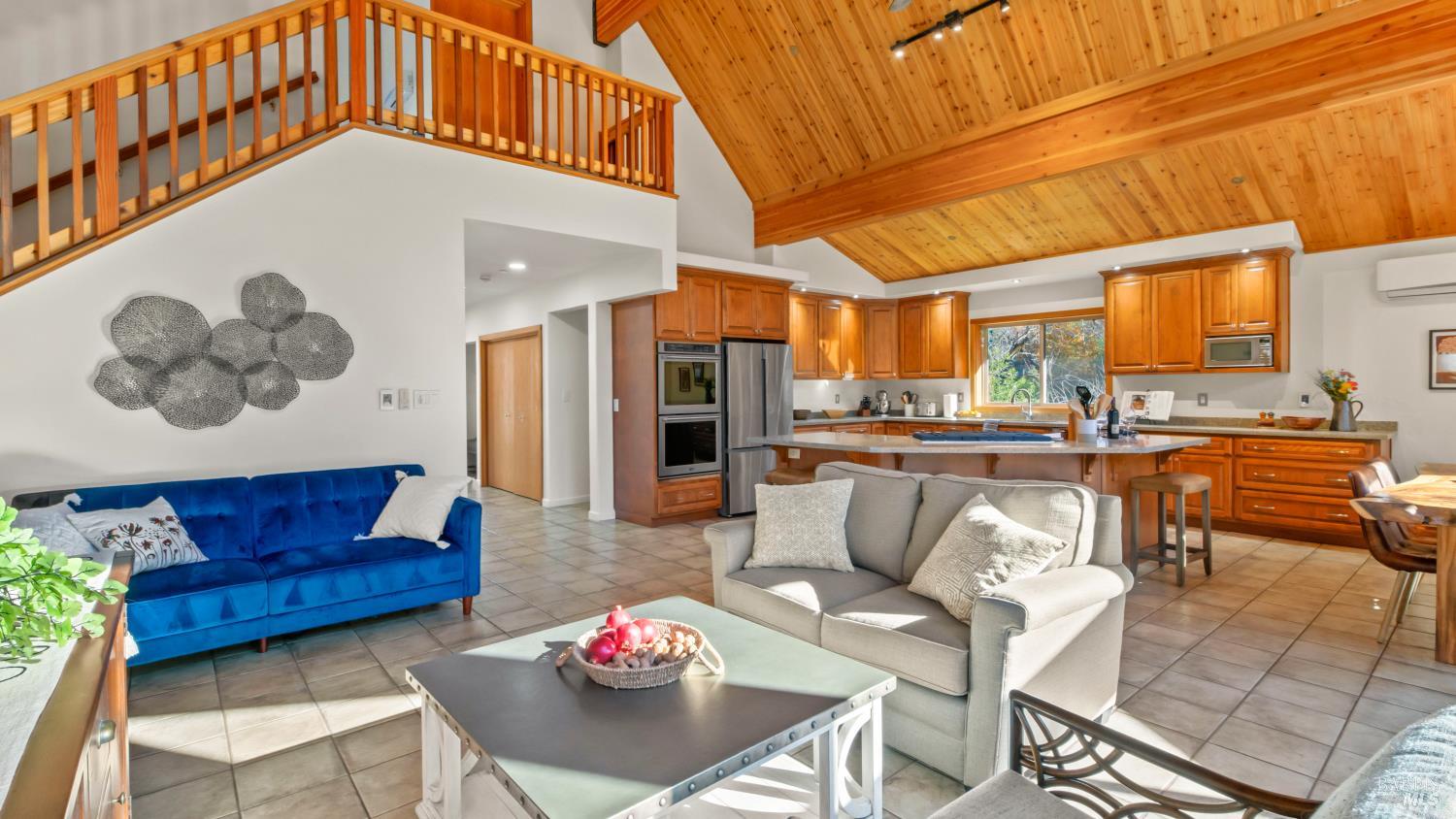 11081 Van Dorn Reservoir Road, Unit 1 Middletown, CA 95461 - Photo 12 of 68 a living room with furniture and kitchen view
