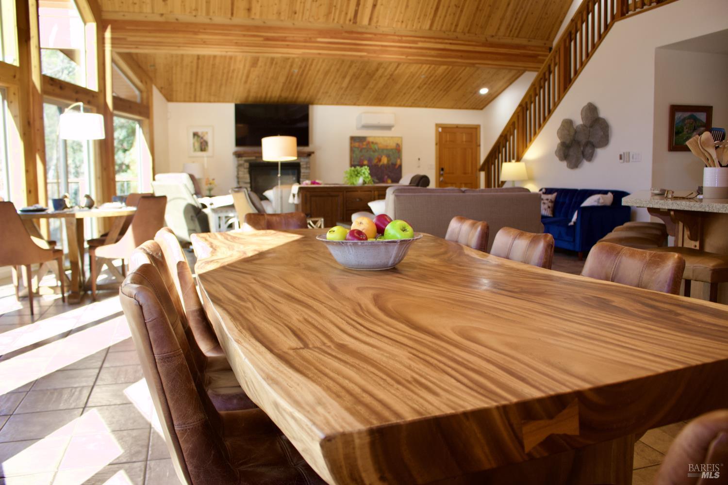 11081 Van Dorn Reservoir Road, Unit 1 Middletown, CA 95461 - Photo 60 of 68 a view of a dining room with furniture and chandelier