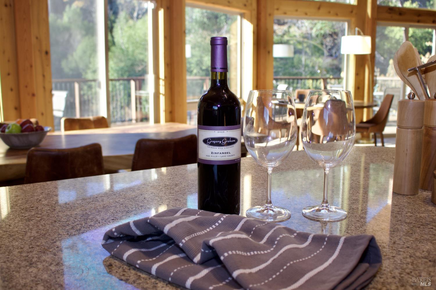 11081 Van Dorn Reservoir Road, Unit 1 Middletown, CA 95461 - Photo 64 of 68 a living room with furniture and a floor to ceiling window