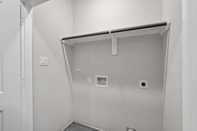 a view of a yard with a wooden fence