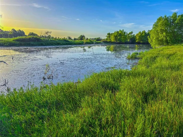 a view of a yard with an outdoor space and seating
