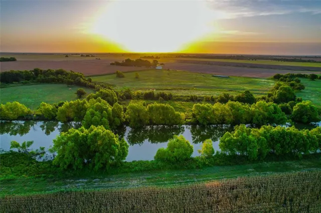 a view of a city with a lake