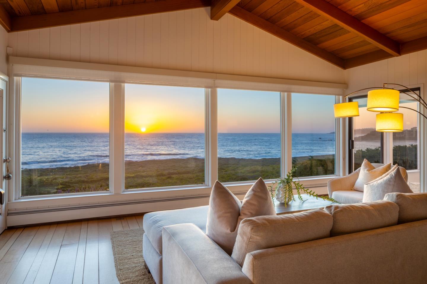 2715 Ribera Road Carmel, CA 93923 - Photo 1 of 41 a living room with fireplace furniture and a large window