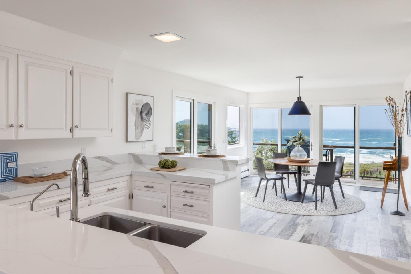 2715 Ribera Road Carmel, CA 93923 - Photo 11 of 41 a living room with furniture a large window and kitchen view