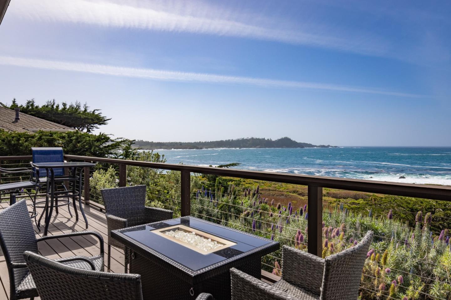 2715 Ribera Road Carmel, CA 93923 - Photo 14 of 41 a view of a balcony with mountain view and wooden floor