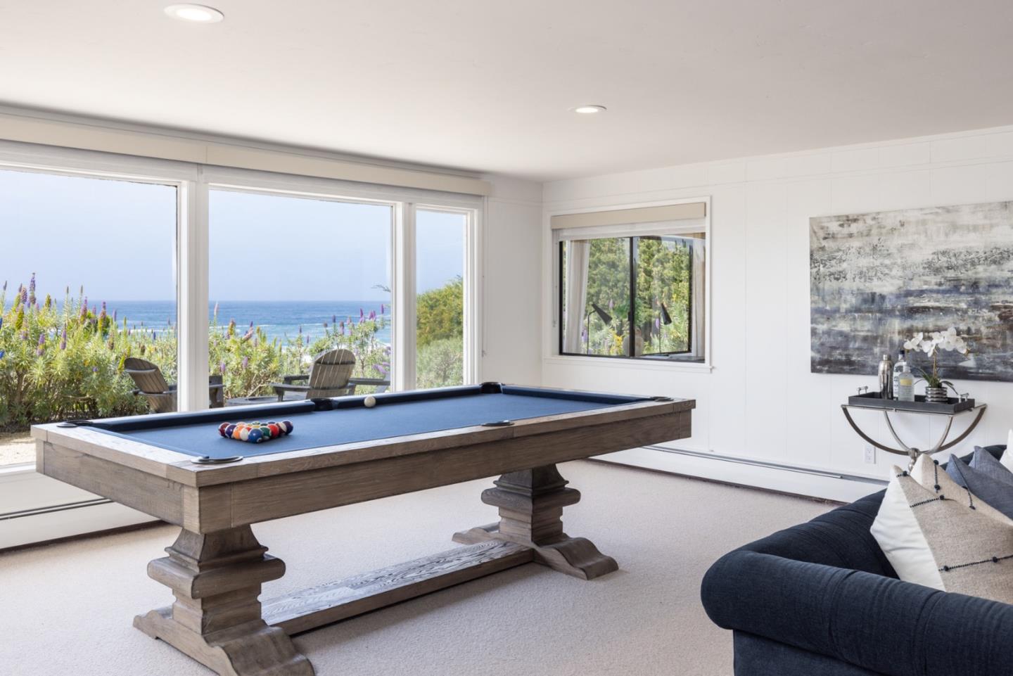 2715 Ribera Road Carmel, CA 93923 - Photo 25 of 41 a room with gym equipment and windows