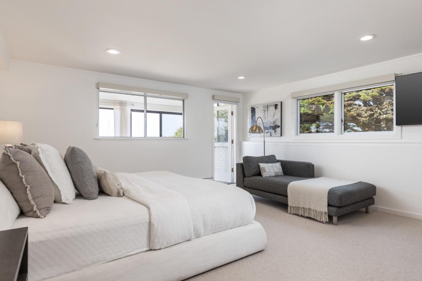 2715 Ribera Road Carmel, CA 93923 - Photo 29 of 41 a bedroom with furniture and a window