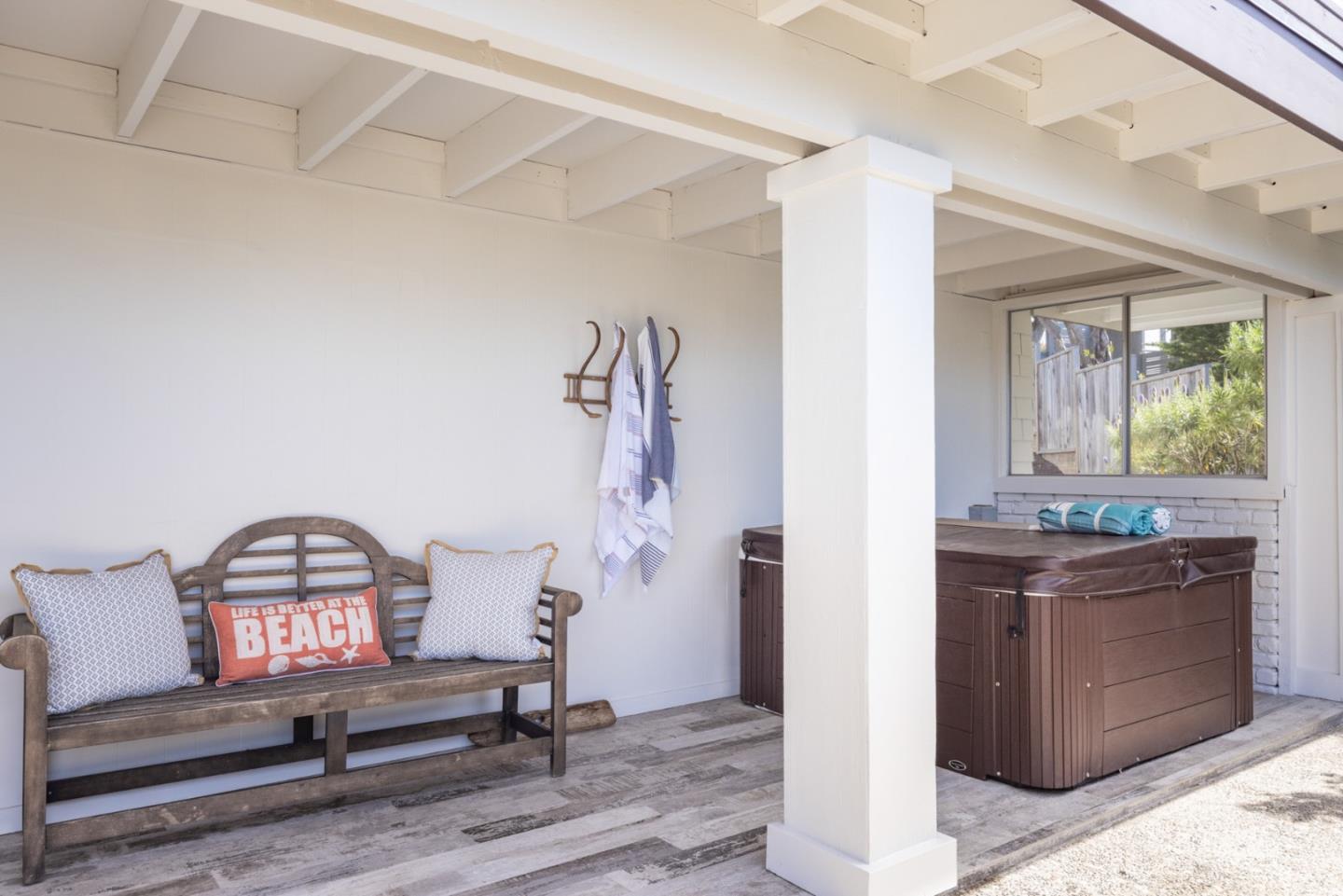 2715 Ribera Road Carmel, CA 93923 - Photo 32 of 41 a living room with furniture and a window