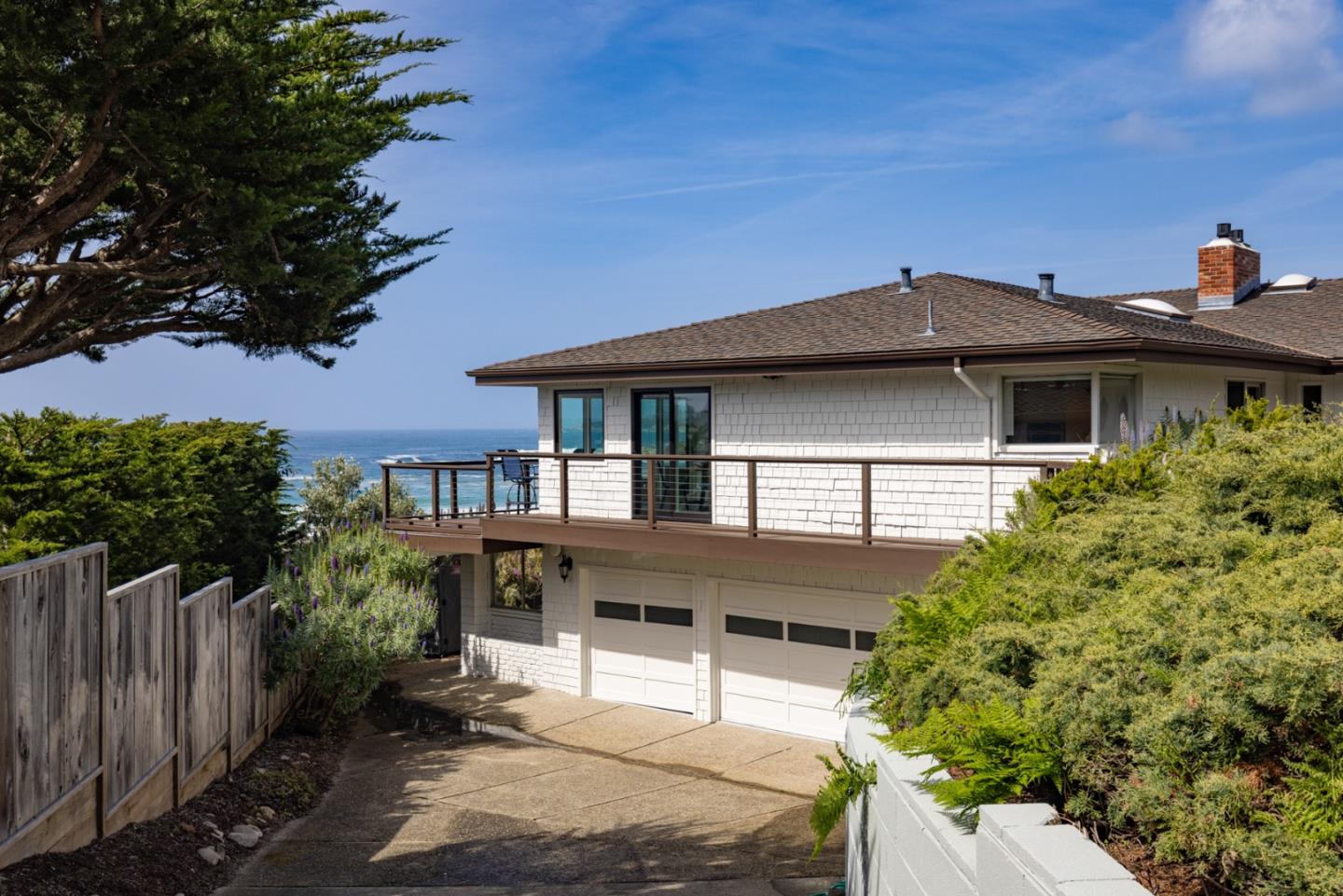 2715 Ribera Road Carmel, CA 93923 - Photo 33 of 41 a front view of a house with a yard