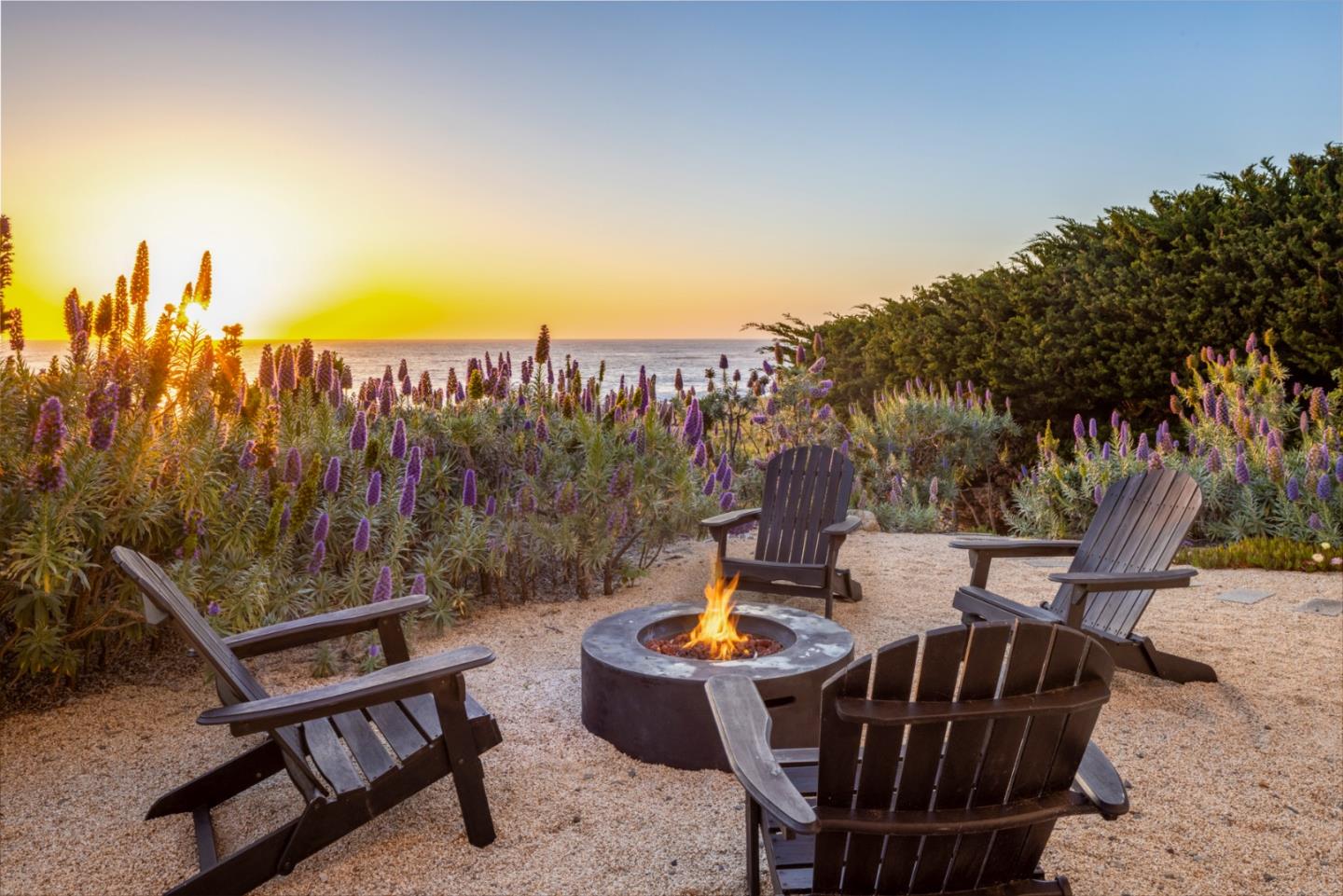 2715 Ribera Road Carmel, CA 93923 - Photo 39 of 41 a view of a swimming pool with a lounge chairs