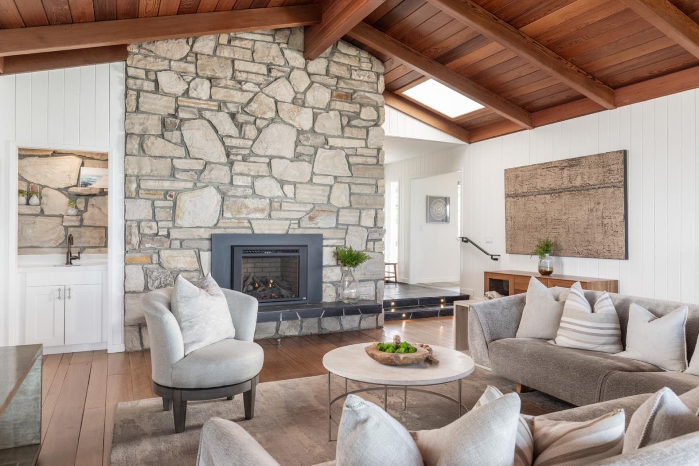 2715 Ribera Road Carmel, CA 93923 - Photo 8 of 41 a living room with furniture and a fireplace