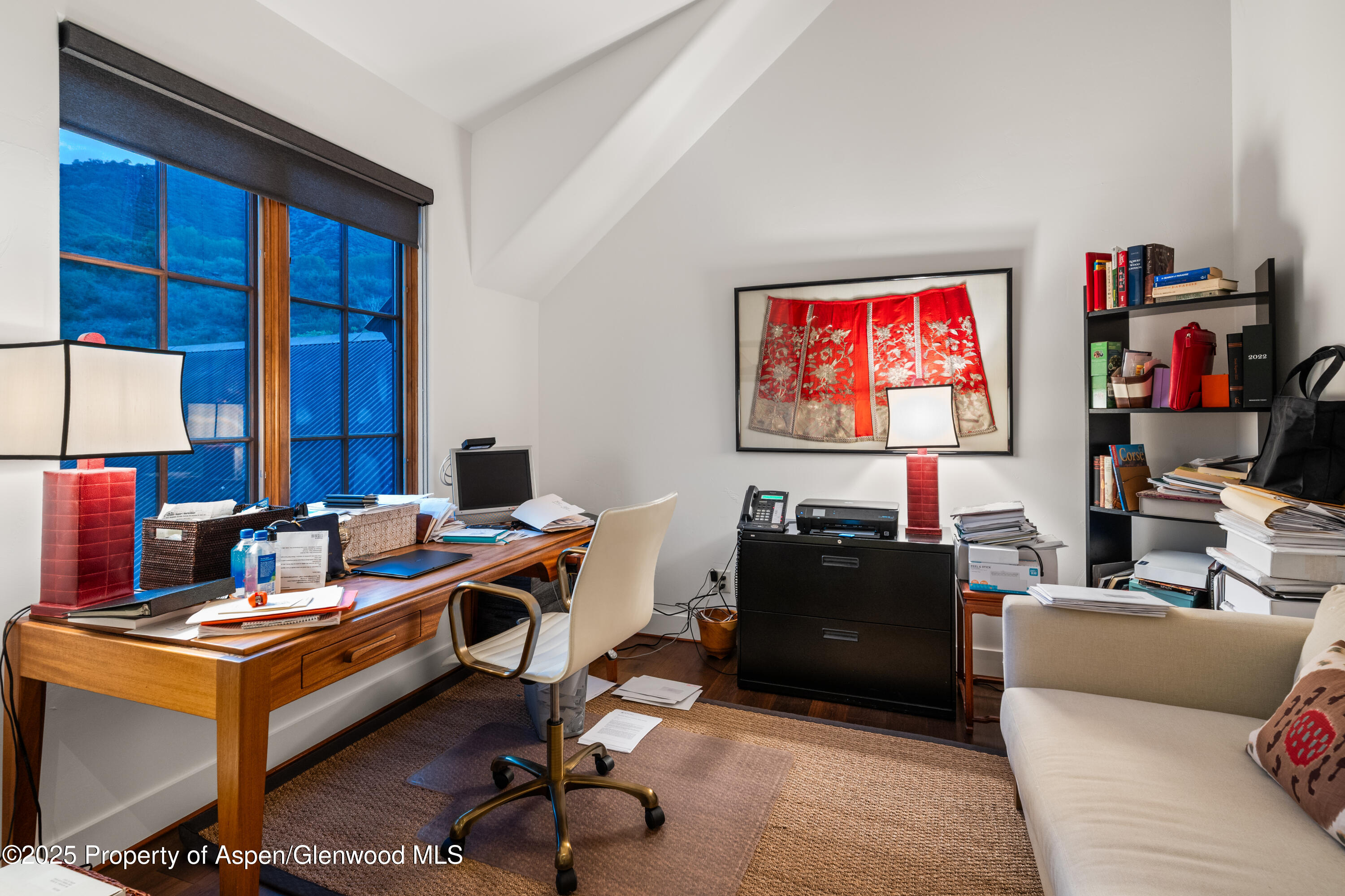 256 Twining Flats Road Aspen, CO 81611 - Photo 18 of 42 a view of a workspace with furniture