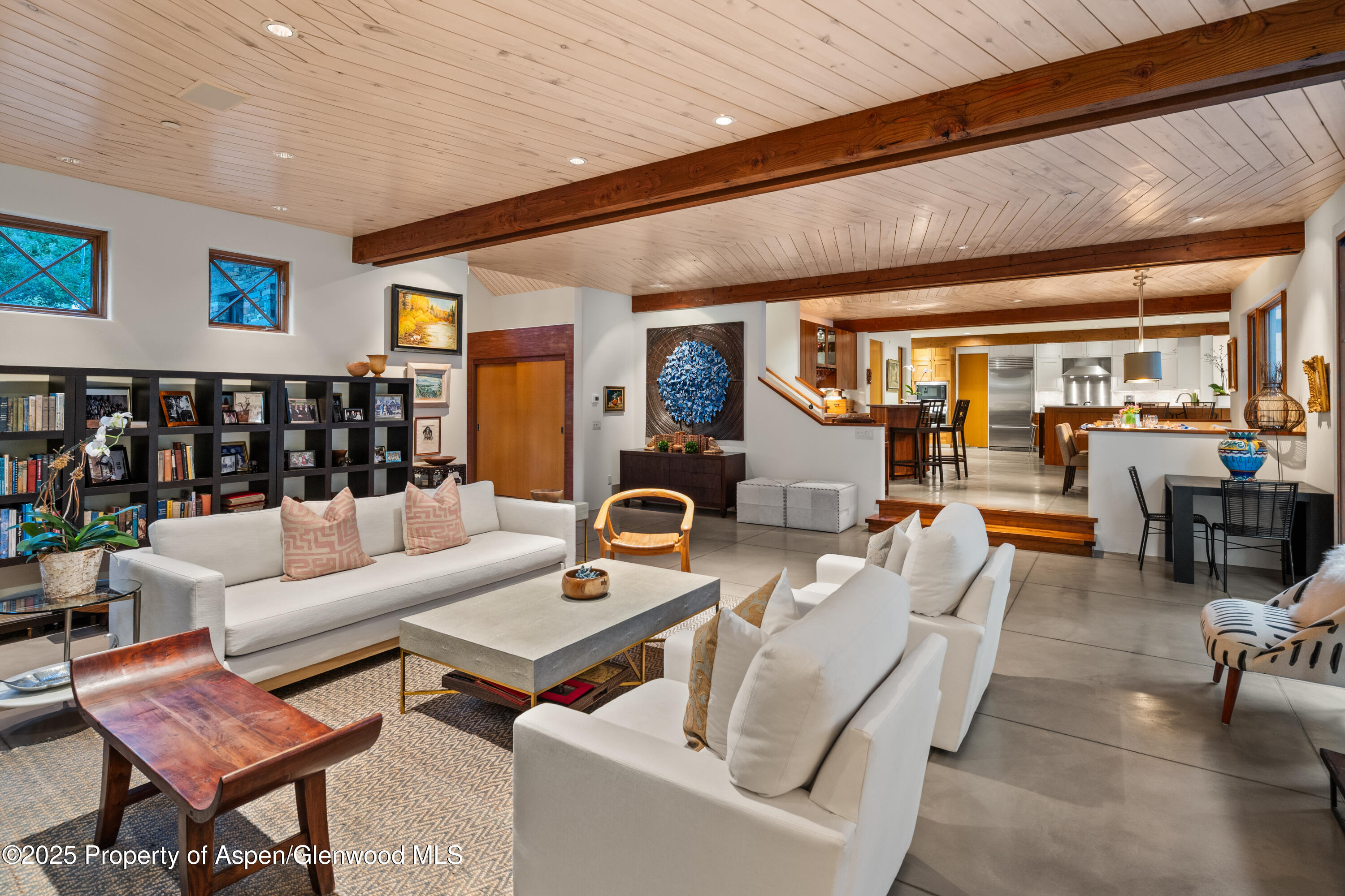 256 Twining Flats Road Aspen, CO 81611 - Photo 10 of 42 a living room with furniture and wooden floor