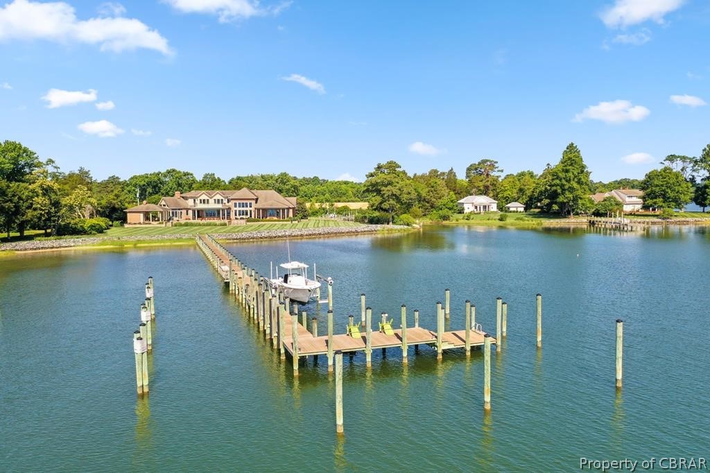 2055 Ditchley Road Kilmarnock, VA 22482 - Photo 4 of 48 View of dock featuring a water view