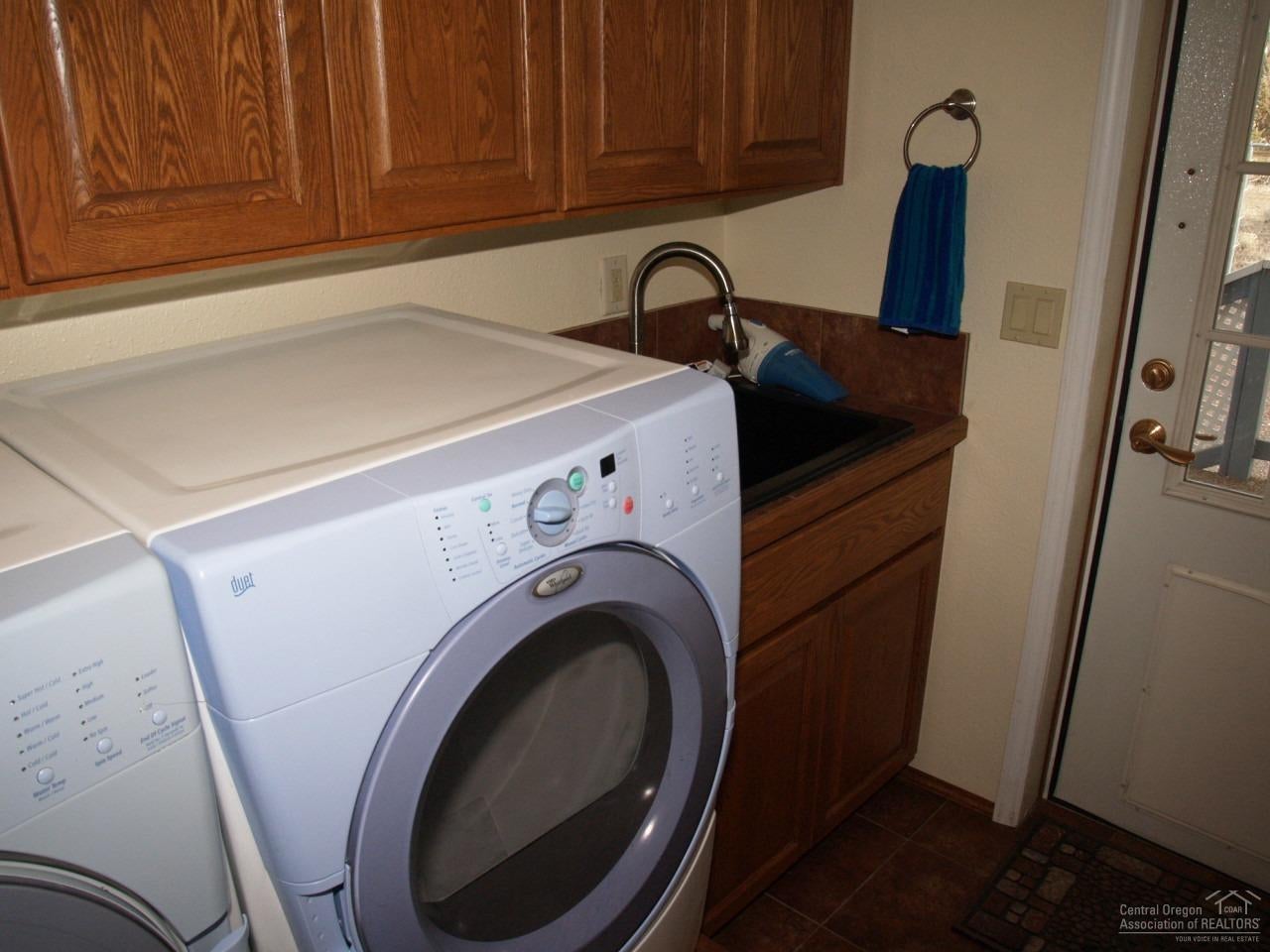 7162 Southwest Shad Road Terrebonne, OR 97760 - Photo 18 of 24 Utility sink in laundry room convenientl