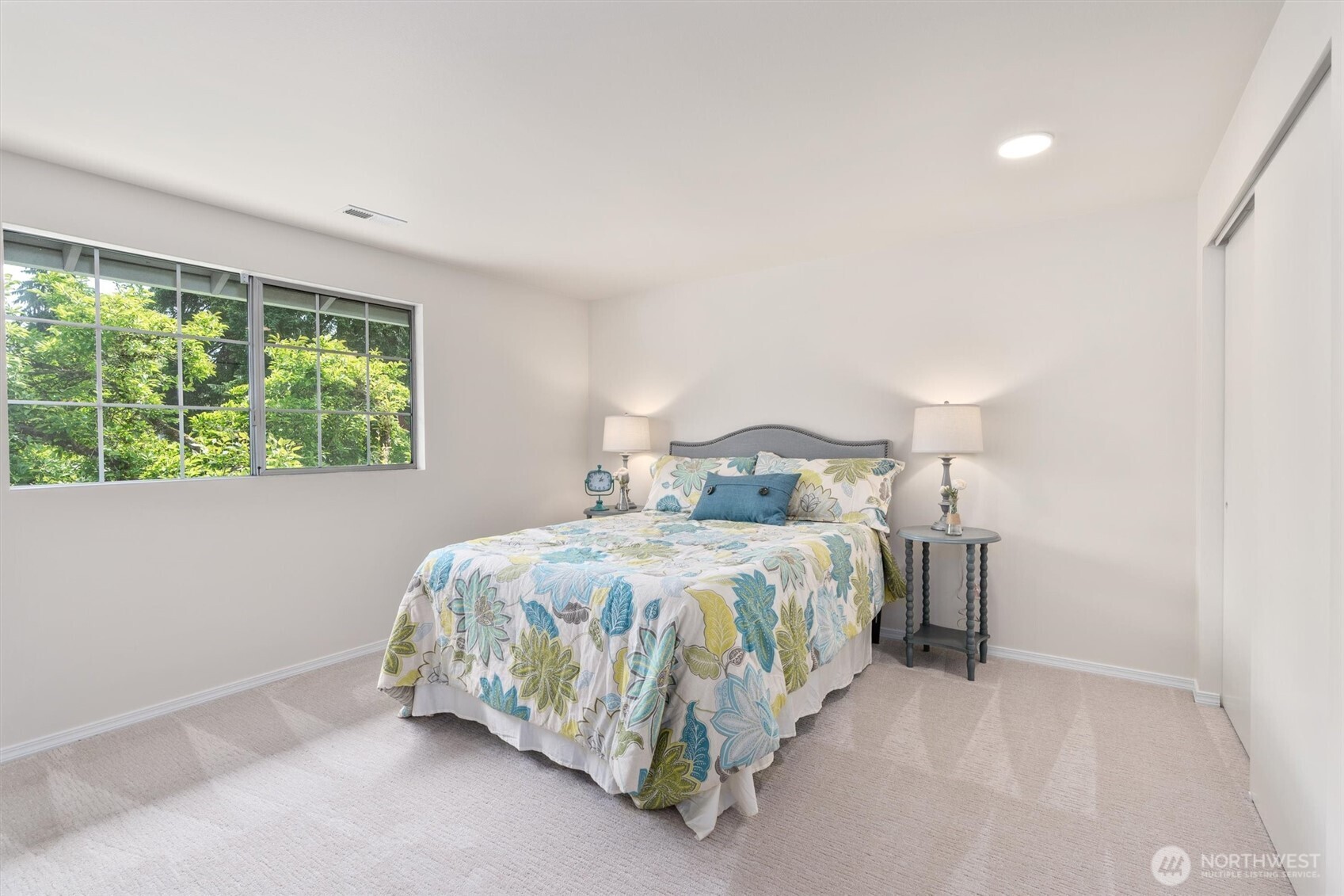 2101 233rd Street Southeast Bothell, WA 98021 - Photo 19 of 40 a bedroom with a bed and a window