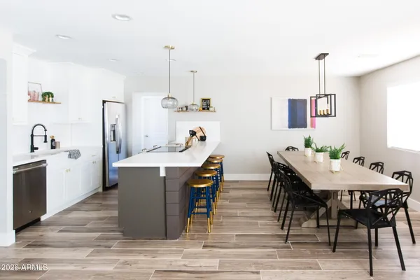 a view of a dining room with furniture