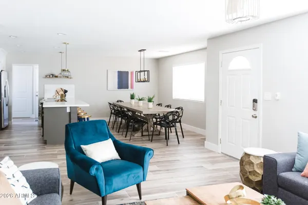 a view of a livingroom and dining room