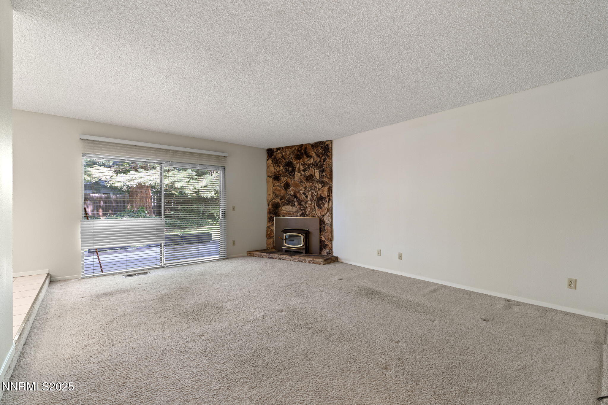 4899 Cool Springs Drive Reno, NV 89509 - Photo 23 of 41 an empty room with windows