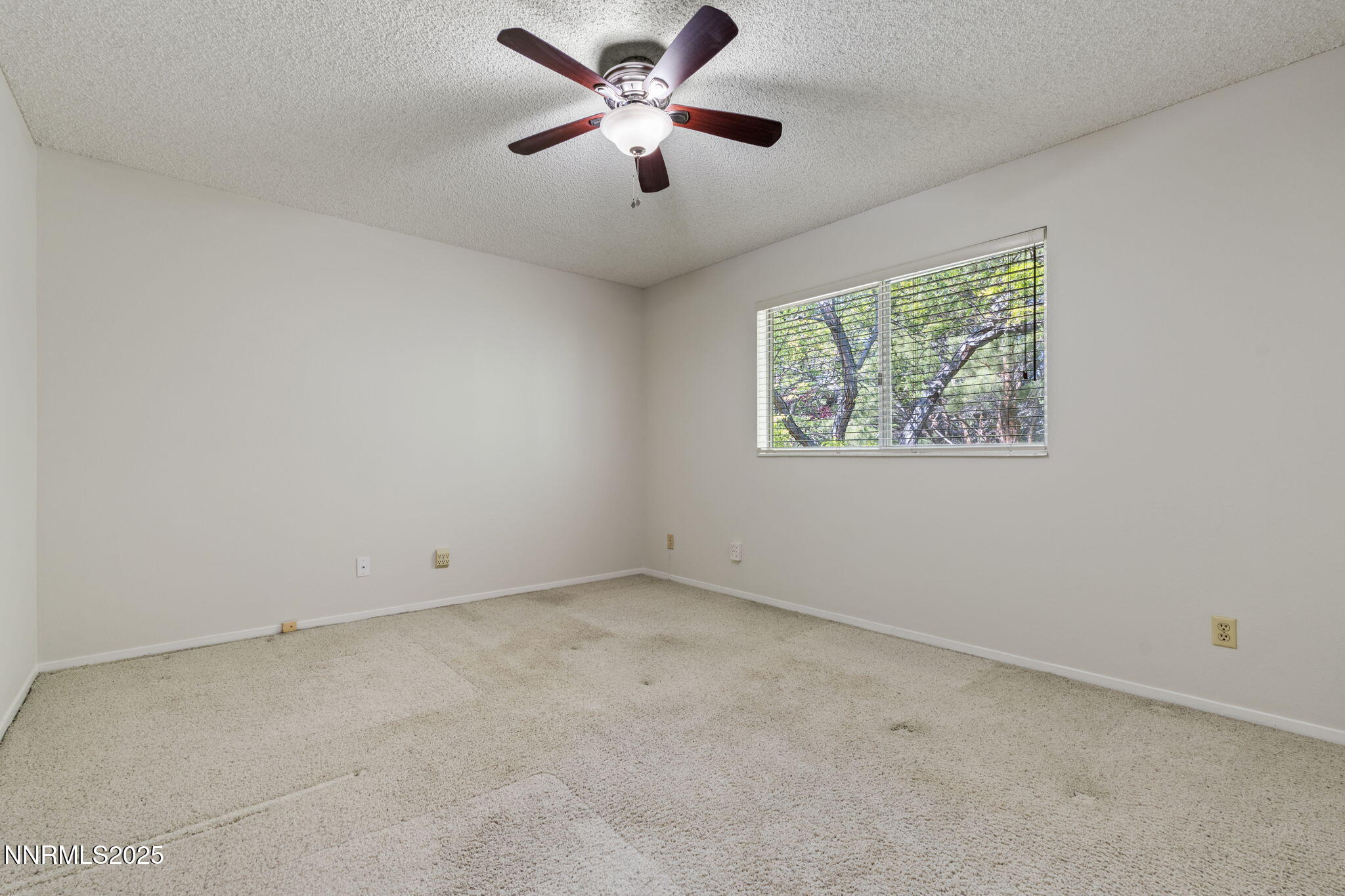 4899 Cool Springs Drive Reno, NV 89509 - Photo 30 of 41 a view of an empty room with a window