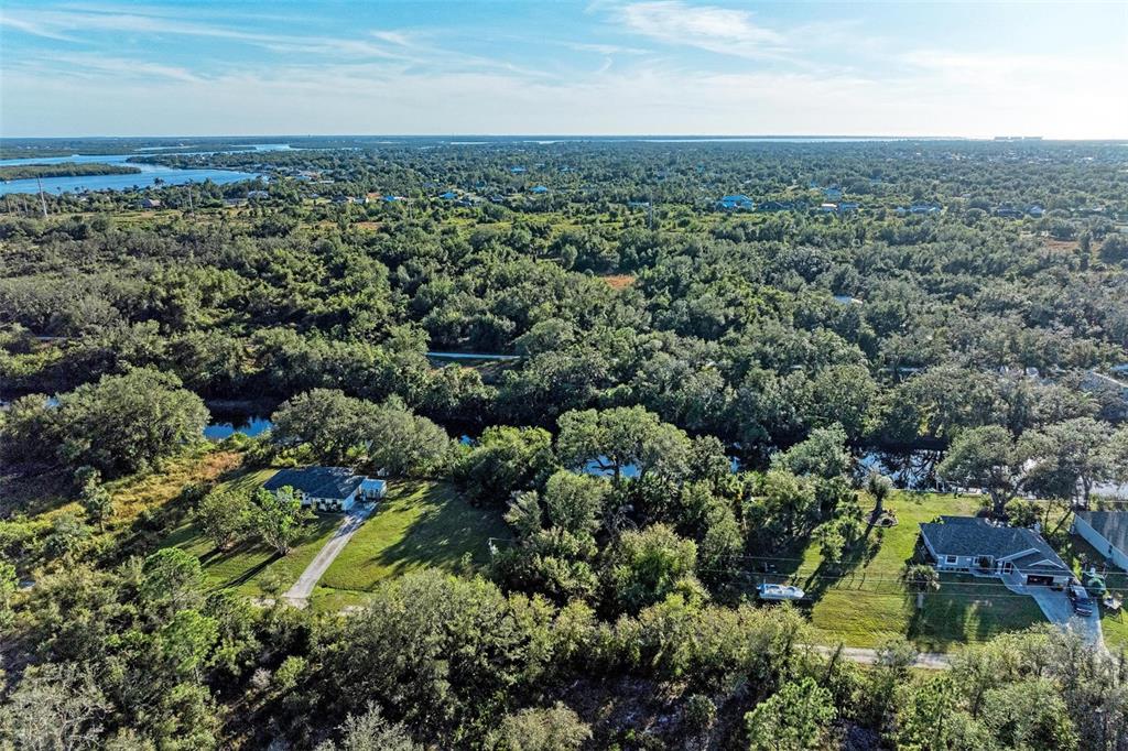 27401 Neaptide Drive Punta Gorda, FL 33983 - Photo 2 of 16 an aerial view of multiple house