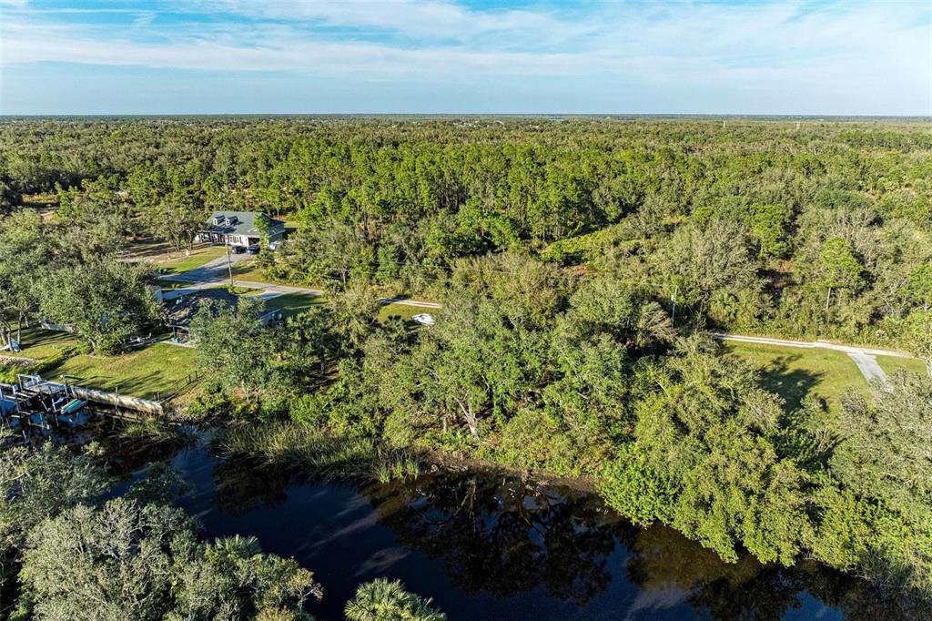 27401 Neaptide Drive Punta Gorda, FL 33983 - Photo 3 of 16 a view of outdoor space and mountain view