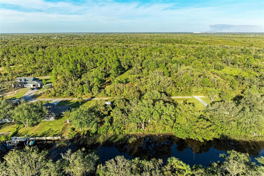 27401 Neaptide Drive Punta Gorda, FL 33983 - Photo 8 of 16 a view of a lake