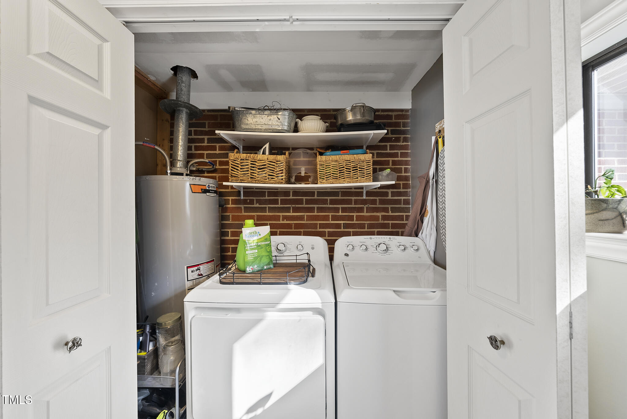 322 Robbins Road Durham, NC 27703 - Photo 29 of 48 a bathroom with a sink and toilet