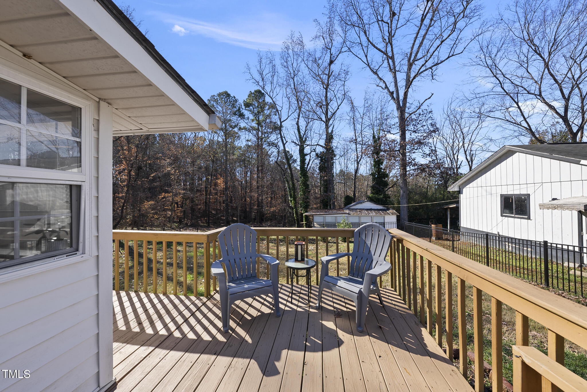 322 Robbins Road Durham, NC 27703 - Photo 30 of 48 a view of balcony with furniture and trees