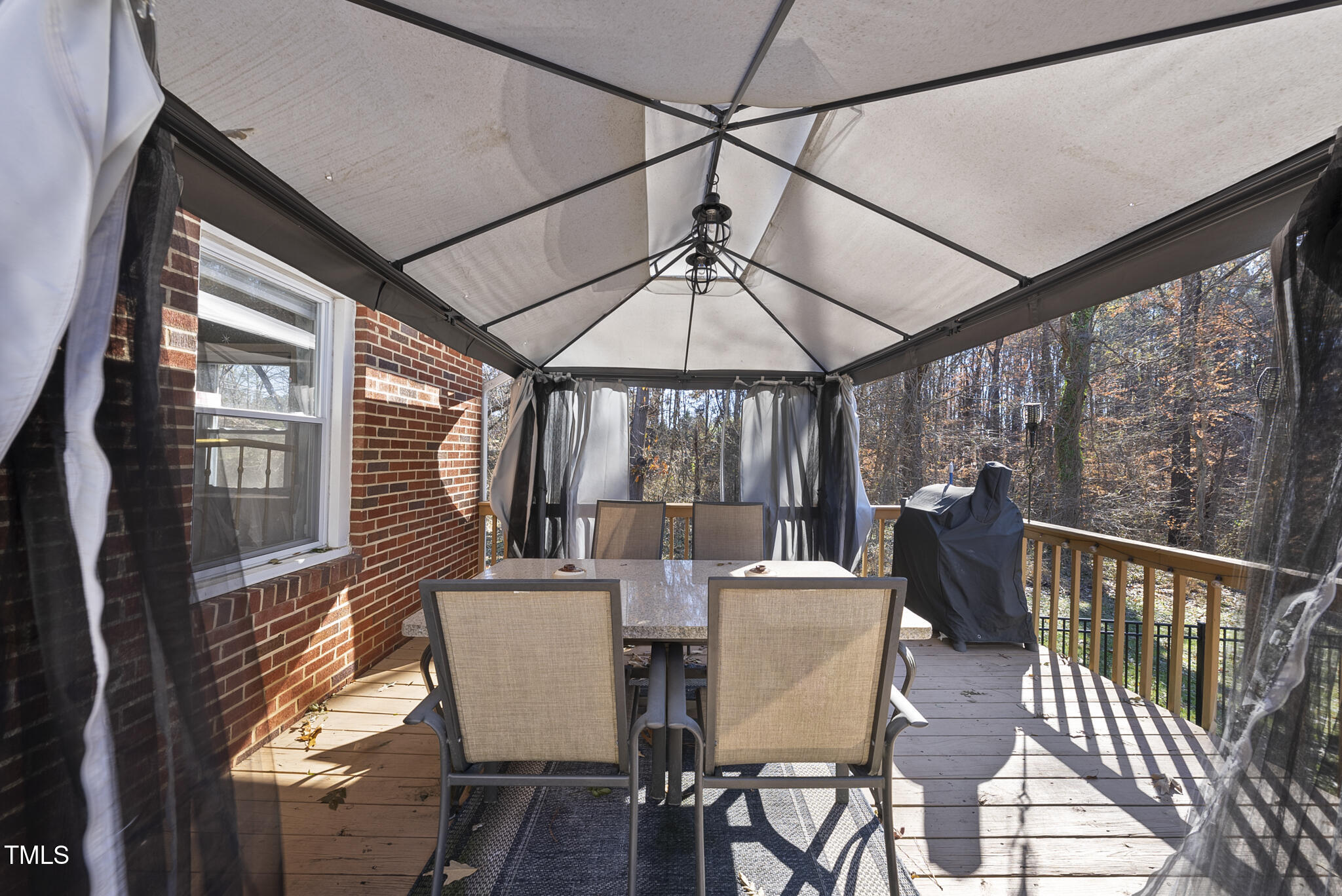 322 Robbins Road Durham, NC 27703 - Photo 33 of 48 a view of a dining room with furniture window and outside view