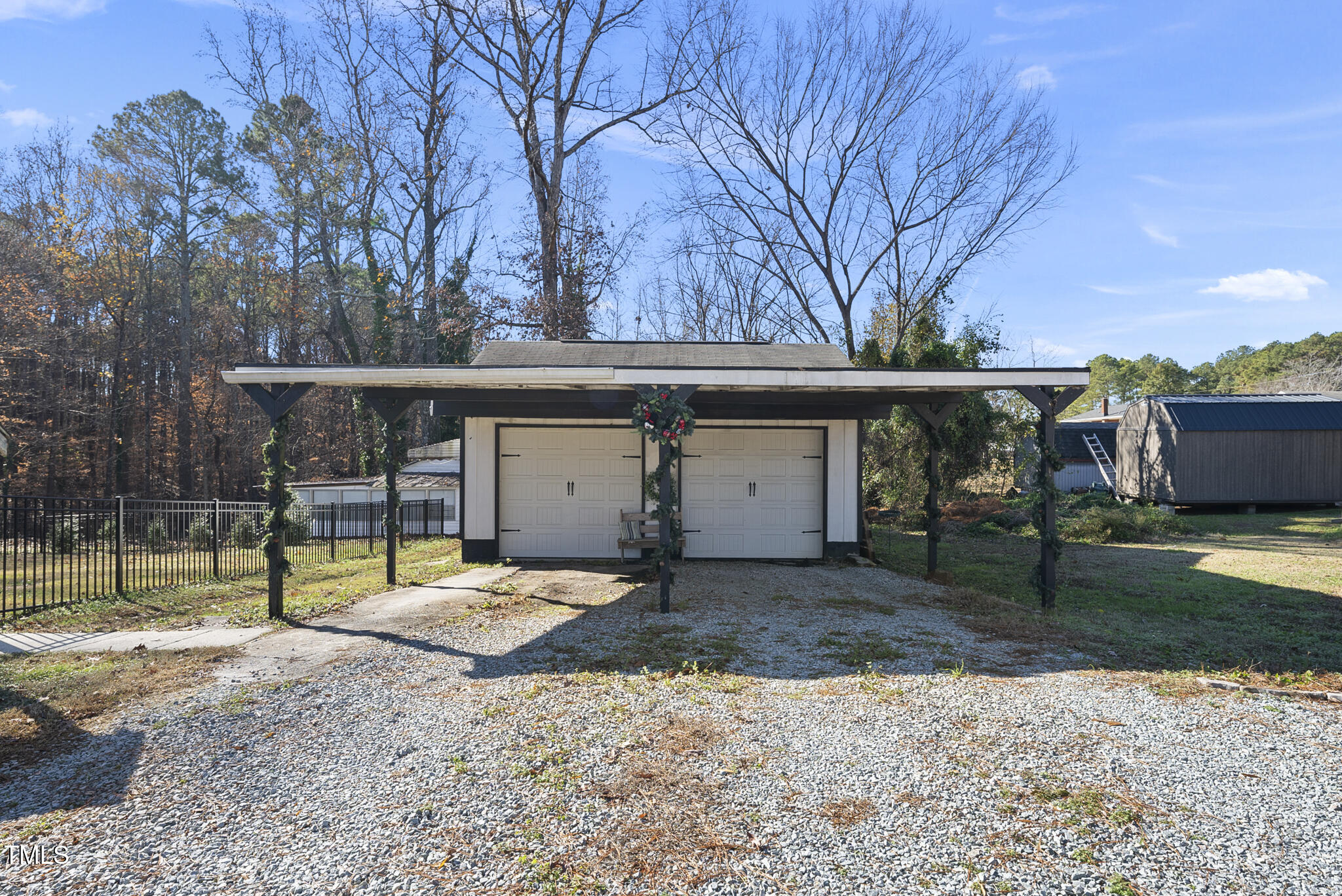 322 Robbins Road Durham, NC 27703 - Photo 39 of 48 a view of a house with backyard and a tree
