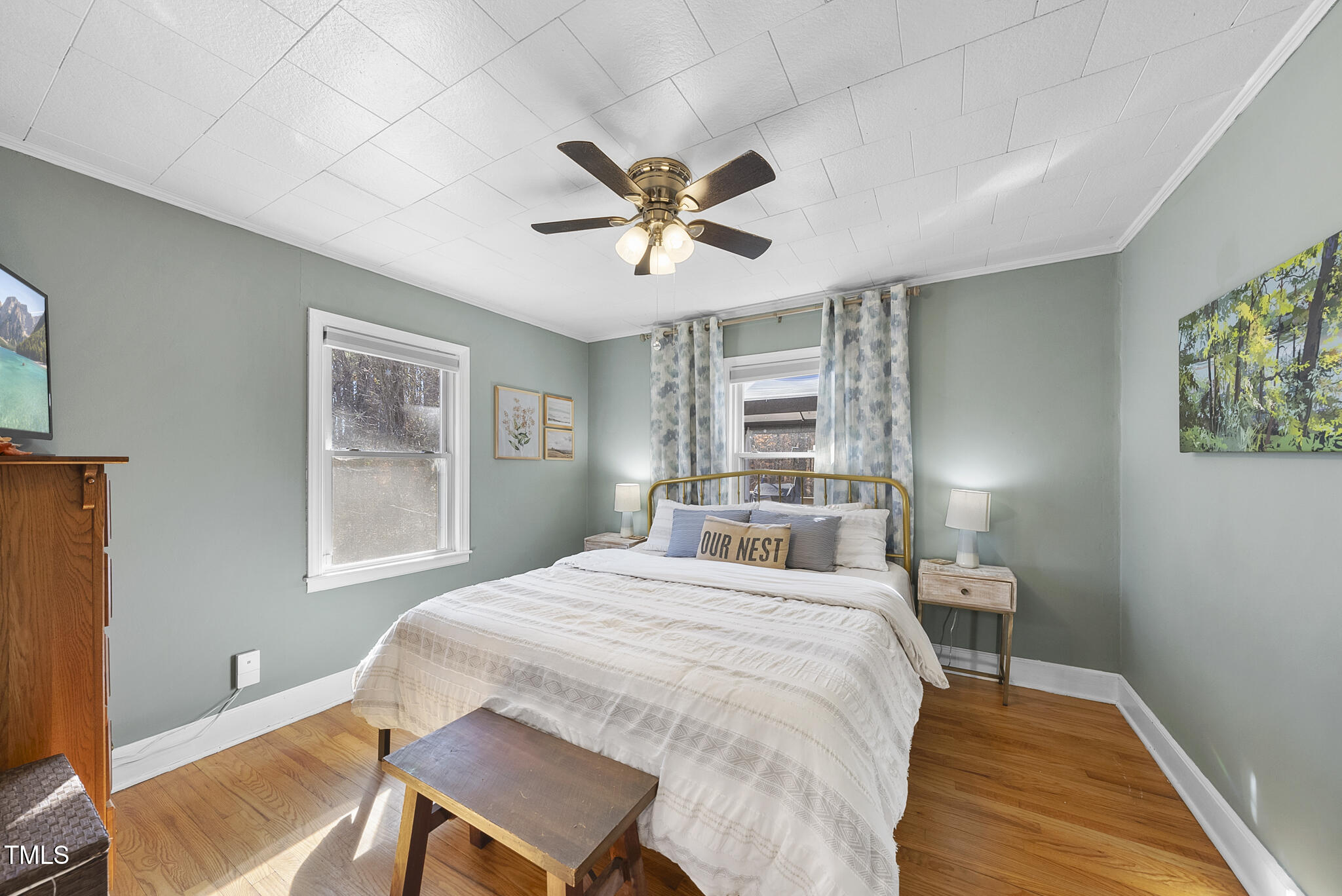 322 Robbins Road Durham, NC 27703 - Photo 10 of 48 a bedroom with a bed and a window