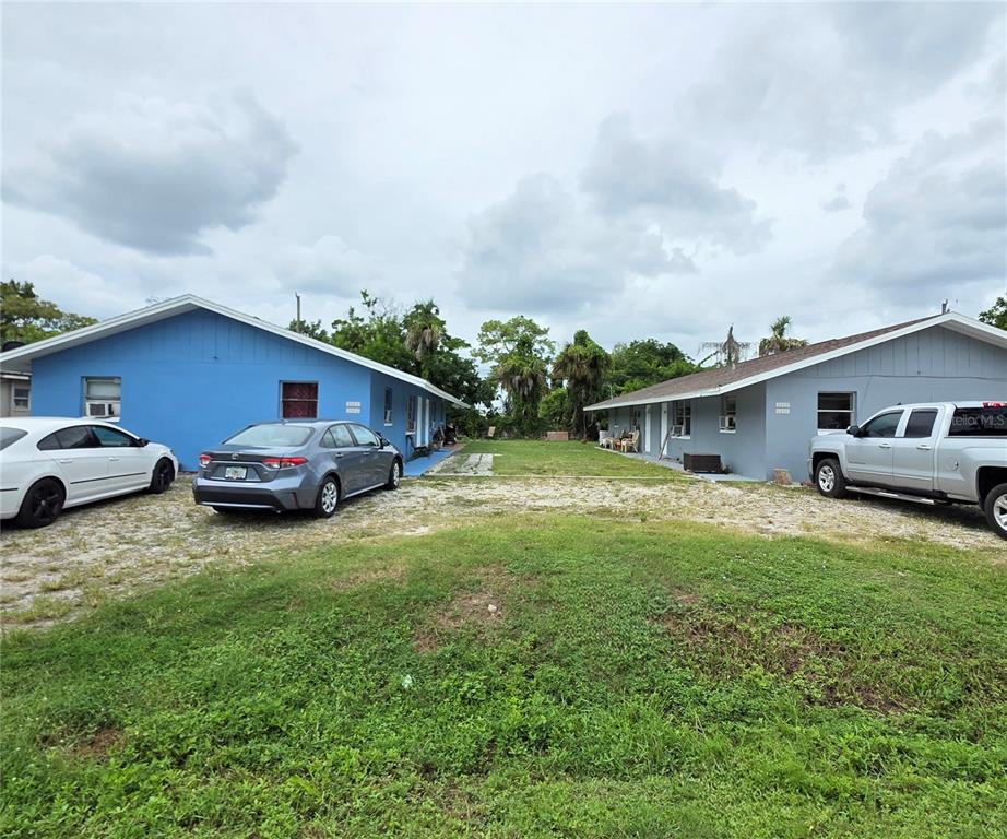 5462 Tenth Avenue Fort Myers, FL 33907 - Photo 20 of 20 a front view of a house with garden