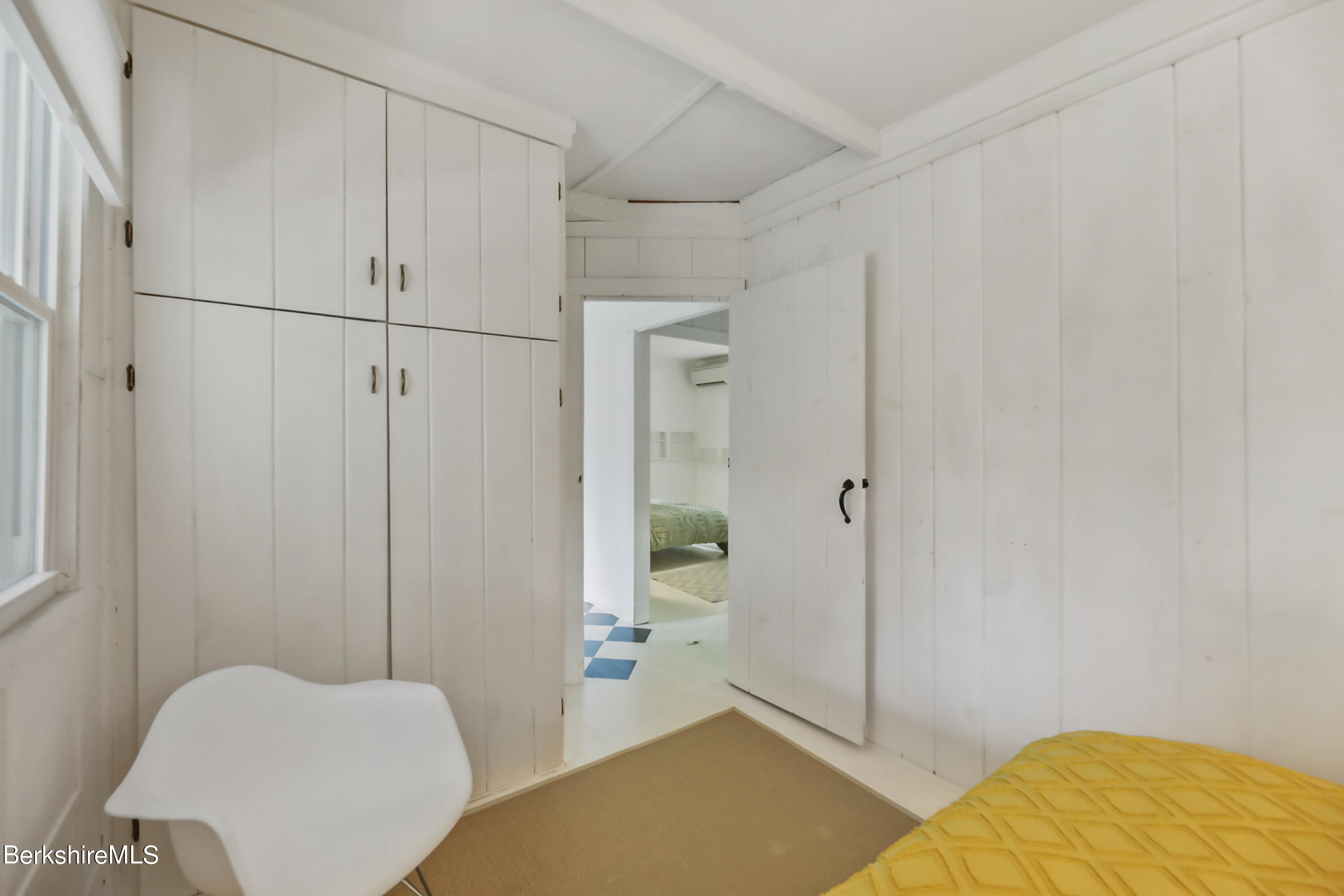11 Mahkeenac Heights Road Stockbridge, MA 01262 - Photo 14 of 26 a bedroom with a bed and furniture