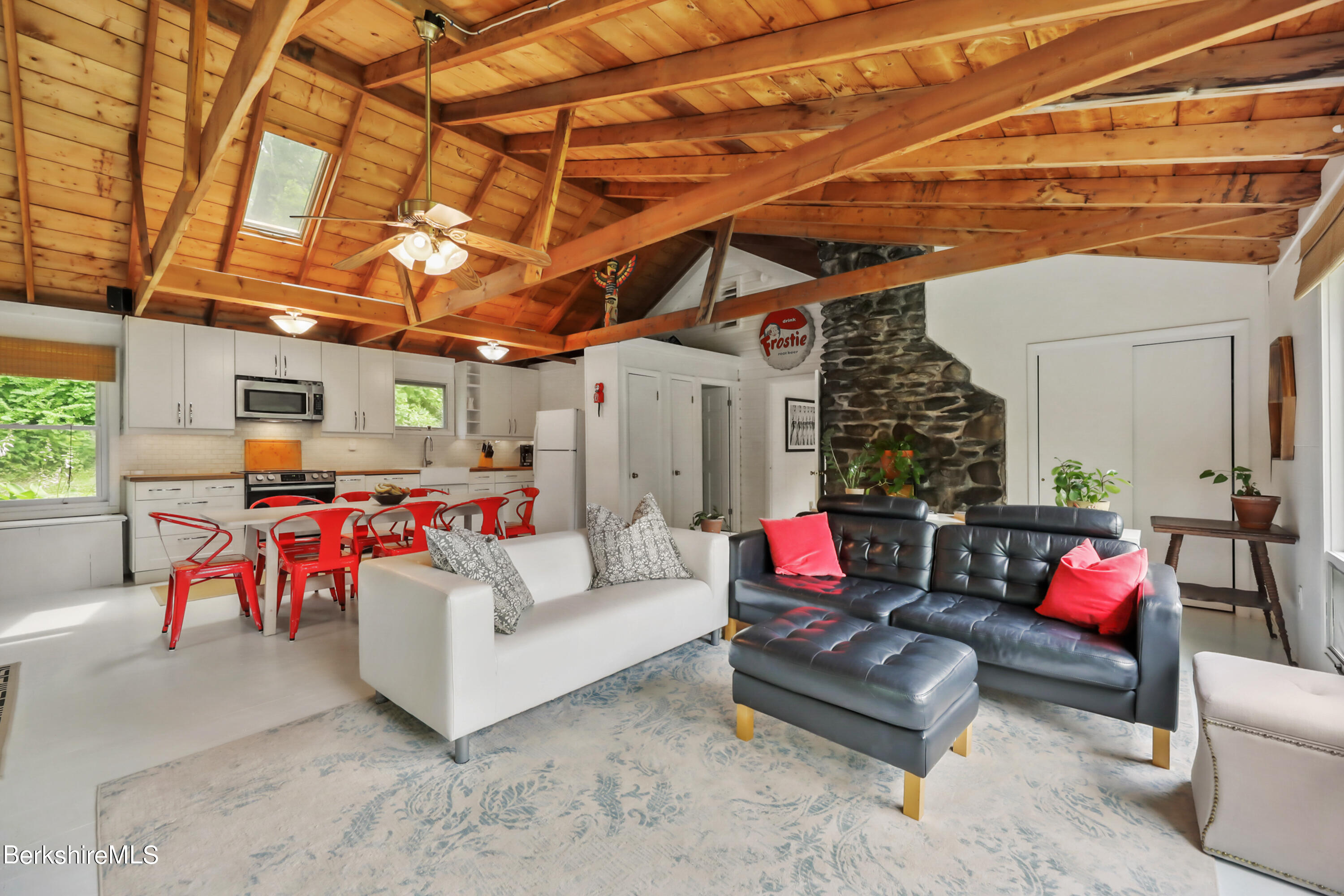 11 Mahkeenac Heights Road Stockbridge, MA 01262 - Photo 2 of 26 a living room with patio furniture and a potted plant
