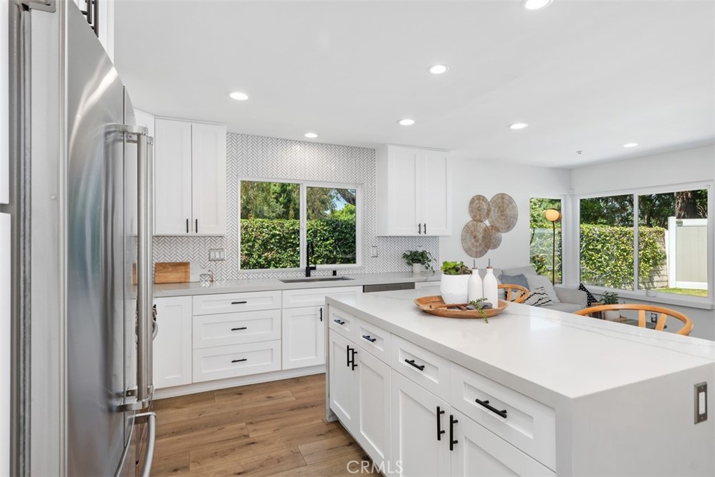 32772 Shipside Drive Dana Point, CA 92629 - Photo 24 of 56 a kitchen with white cabinets and window